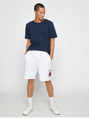 Koton Basic Sports Shorts with Asian Print with a drawstring waist and pocket.