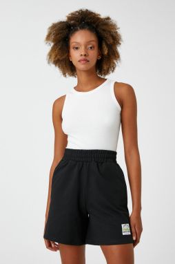 Koton Mini Shorts with a thick elasticated waist. Pockets Tag Detail.
