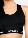 Čierna športová podprsenka so sieťovanými časťami Ivy Park galéria