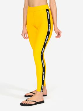 Žlté legíny s čiernym pruhom na nohaviciach Ivy Park