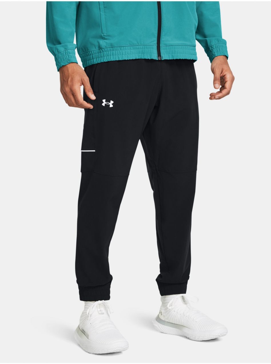 Čierne športové nohavice Under Armour UA Baseline Woven Pant