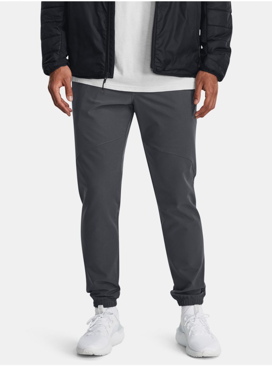Tmavosivé športové tepláky Under Armour UA Stretch Woven CW Jogger