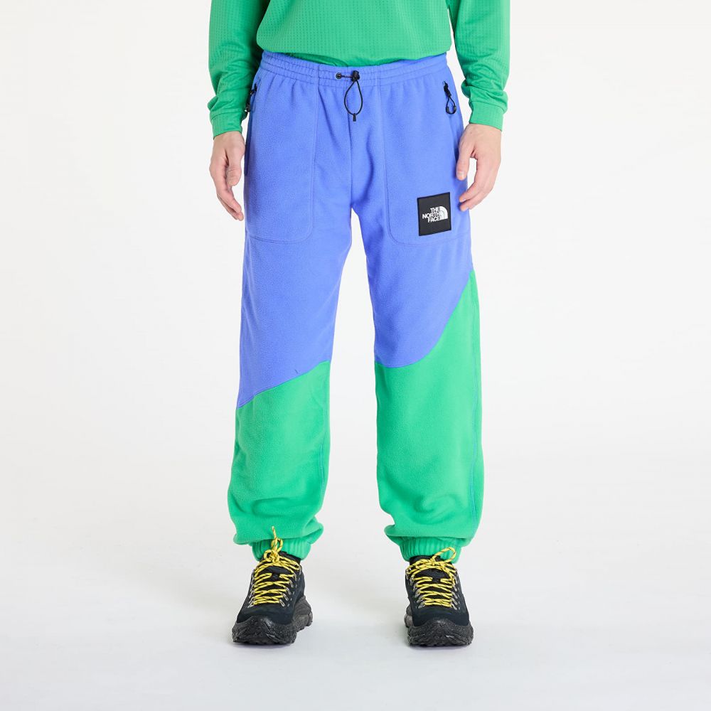Kalhoty The North Face x Yinka Ilori Fleece Pant Solar Blue/ Optic Emerald L