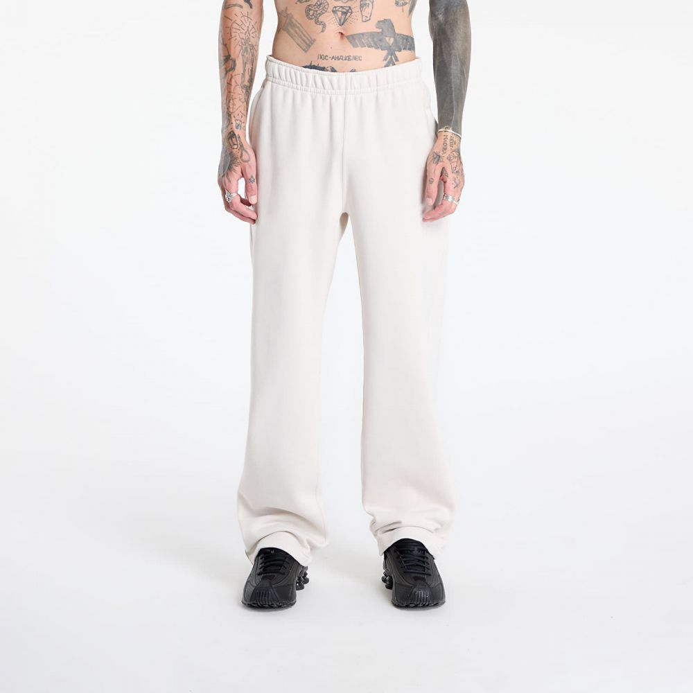 Kalhoty Nike x NOCTA Fleece CS Open-Hem Sweatpants Lt Orewood Brn/ Lt Orewood Brn/ Team Red L