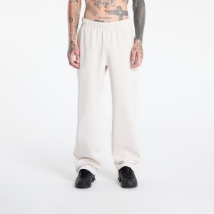 Kalhoty Nike x NOCTA Fleece CS Open-Hem Sweatpants Lt Orewood Brn/ Lt Orewood Brn/ Team Red L
