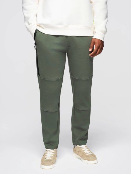 Olivovo-zelené tepláky s prešívaním V4 OM-PASK-0281