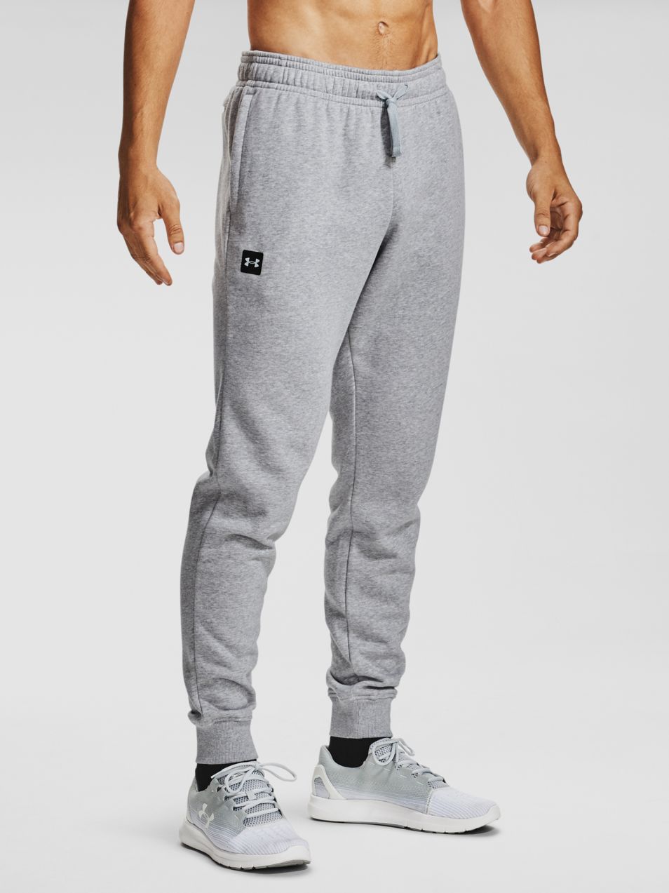 Nohavice a kraťasy pre mužov Under Armour
