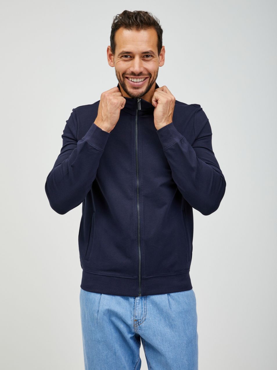 Tmavomodrá pánska mikina na zips Guess