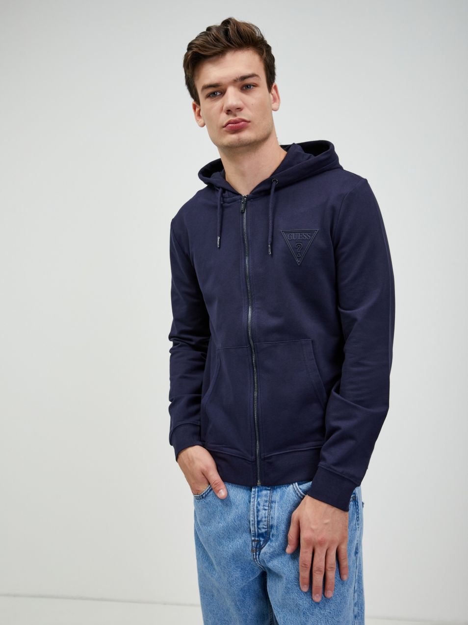 Mikiny s kapucou pre mužov Guess - tmavomodrá