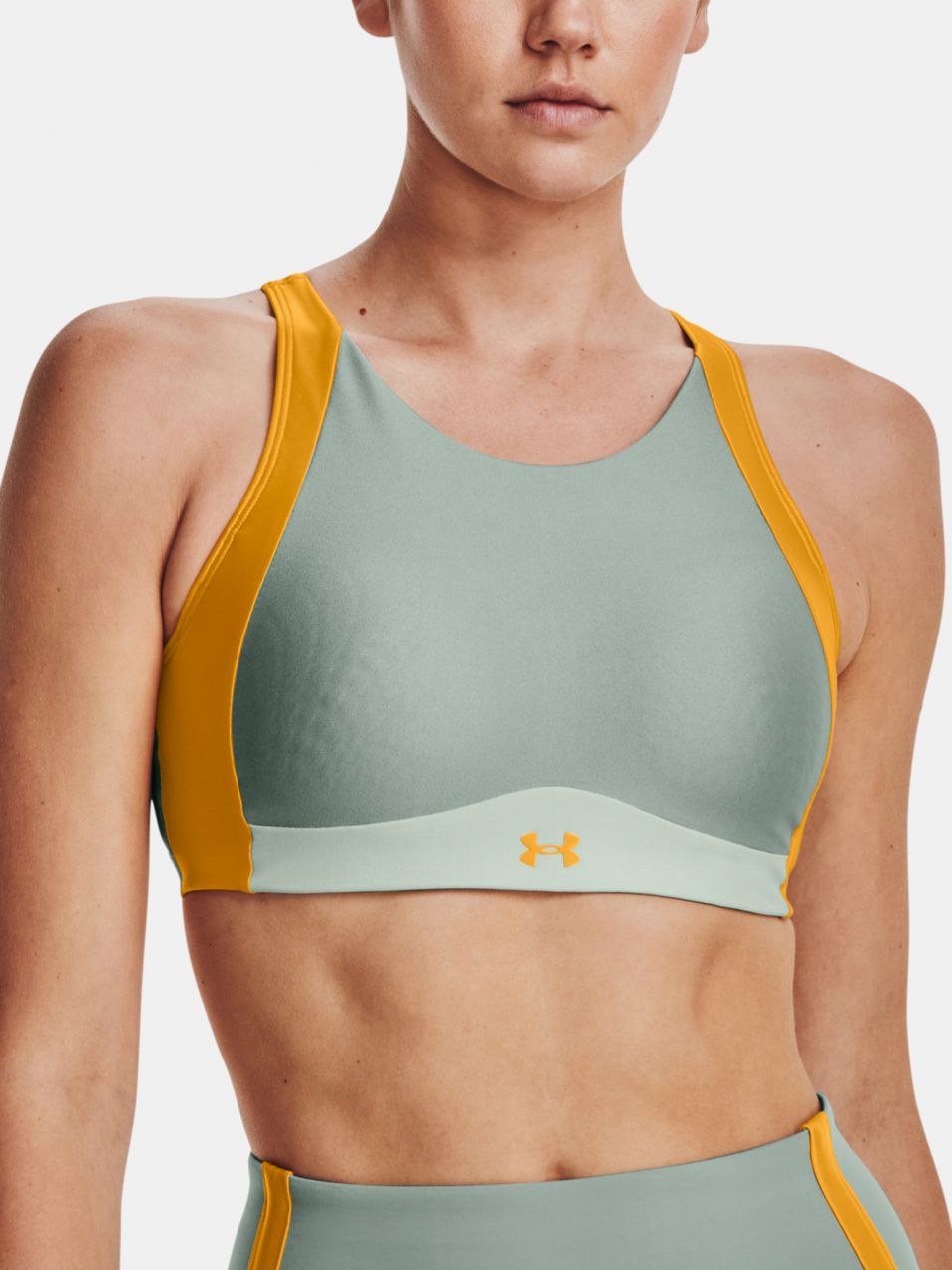 UA Infinity Mid High Neck Shine Športová podprsenka Under Armour 