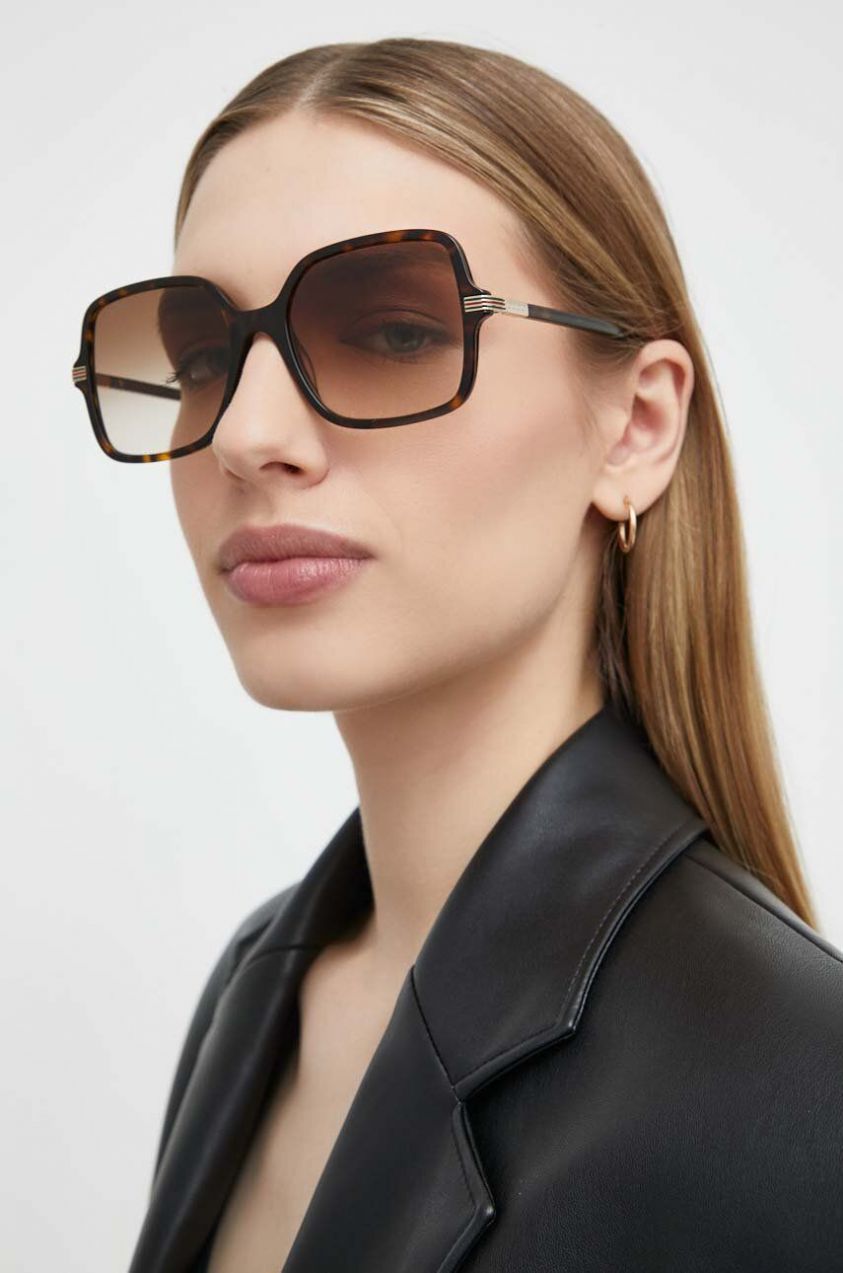 Slnečné okuliare Gucci dámske, hnedá farba, GG1449S