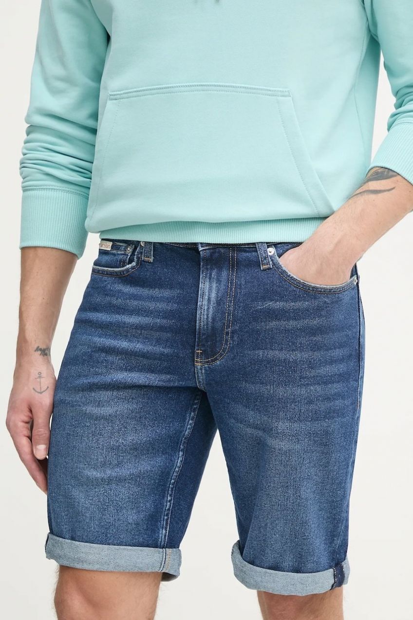Rifľové krátke nohavice Calvin Klein Jeans pánske, tmavomodrá farba, J30J327184