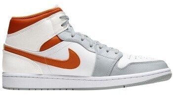 Členkové tenisky Nike  Air Jordan 1 Mid Starfish Orange