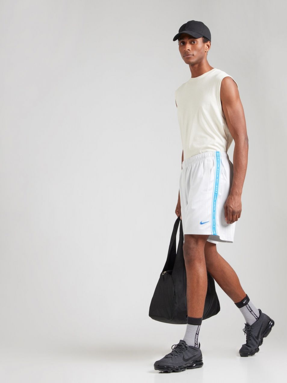 Nike Sportswear Nohavice  azúrová / svetlosivá