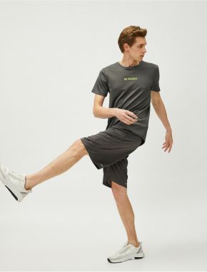 Koton Sports Shorts with Lace-Up Waist and Pocket.