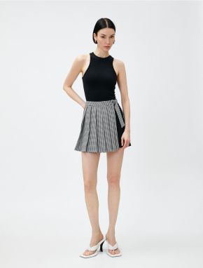 Koton Pleated Mini Skirt with Contrast Detail Belt.