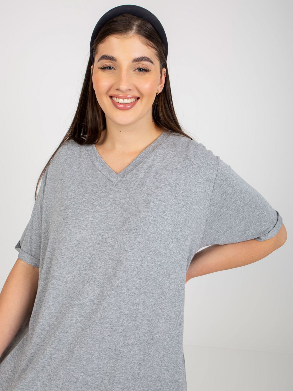 Plain grey blouse of larger size with V-neck
