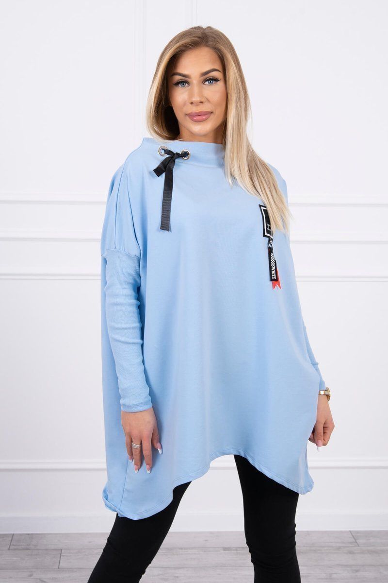 Oversize sweatshirt with asymmetrical sides of cyan color