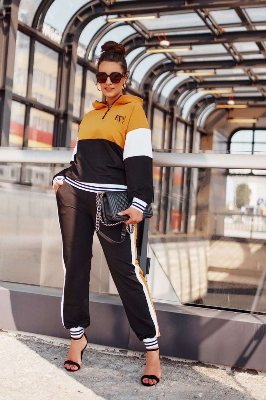 Women's sports set with mustard hood