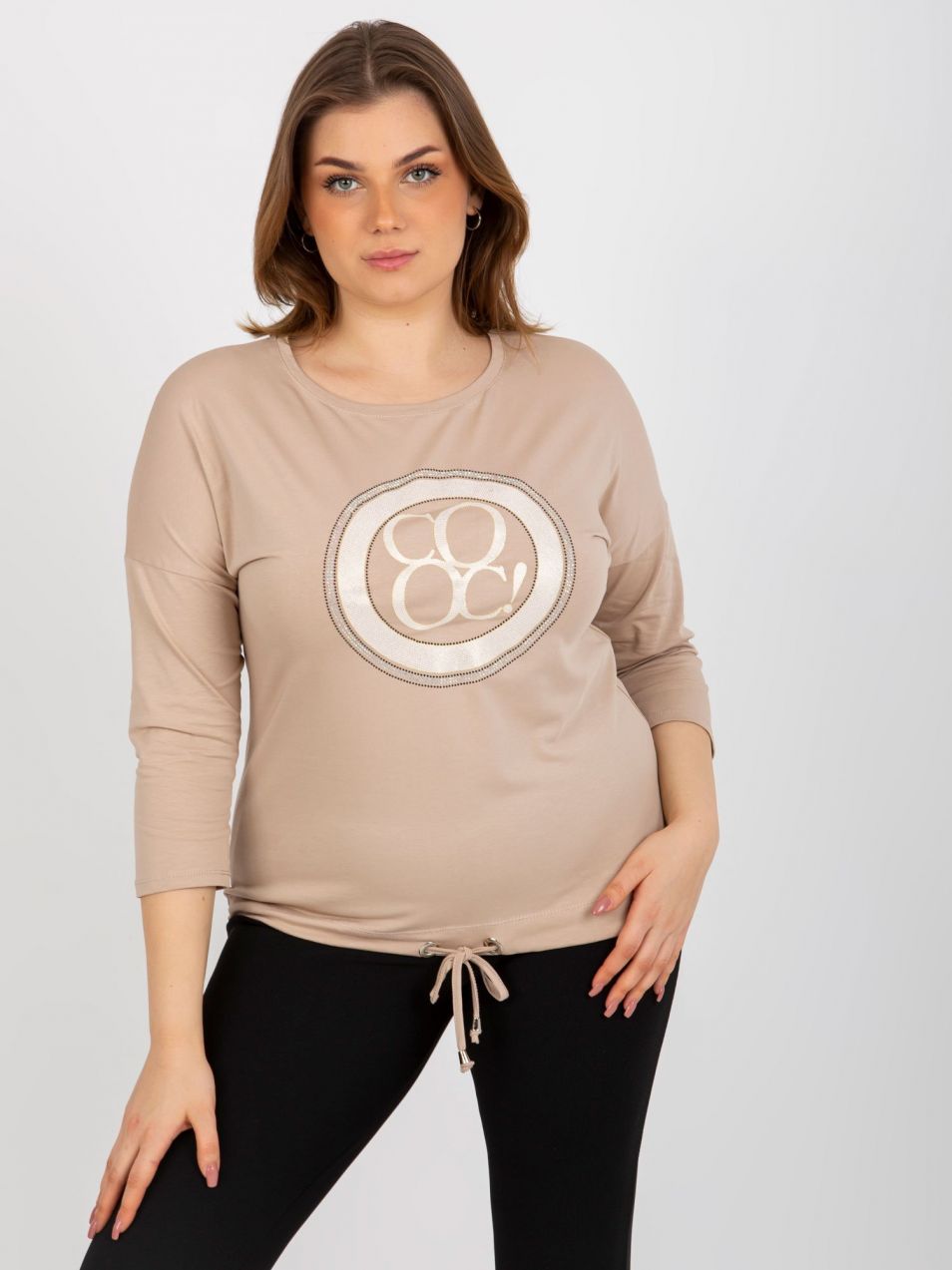 Beige blouse of larger size with ribbed print