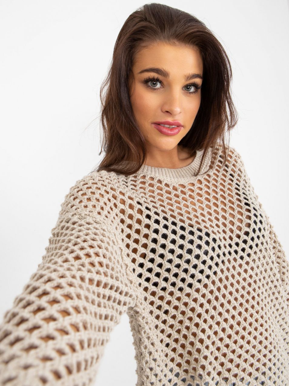 Beige openwork summer sweater with a round neckline
