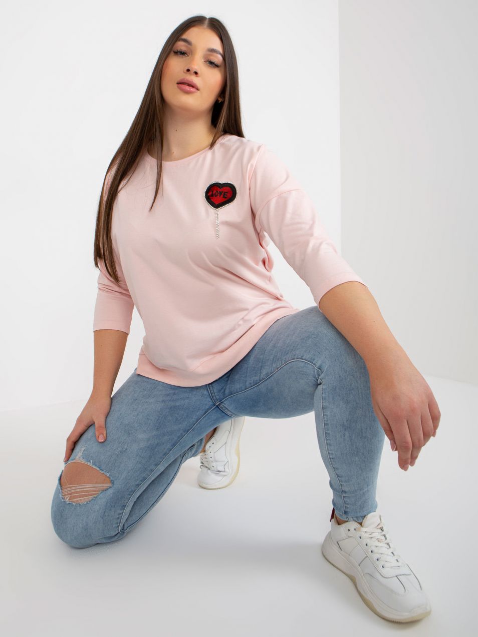 Light pink blouse with round neckline plus size