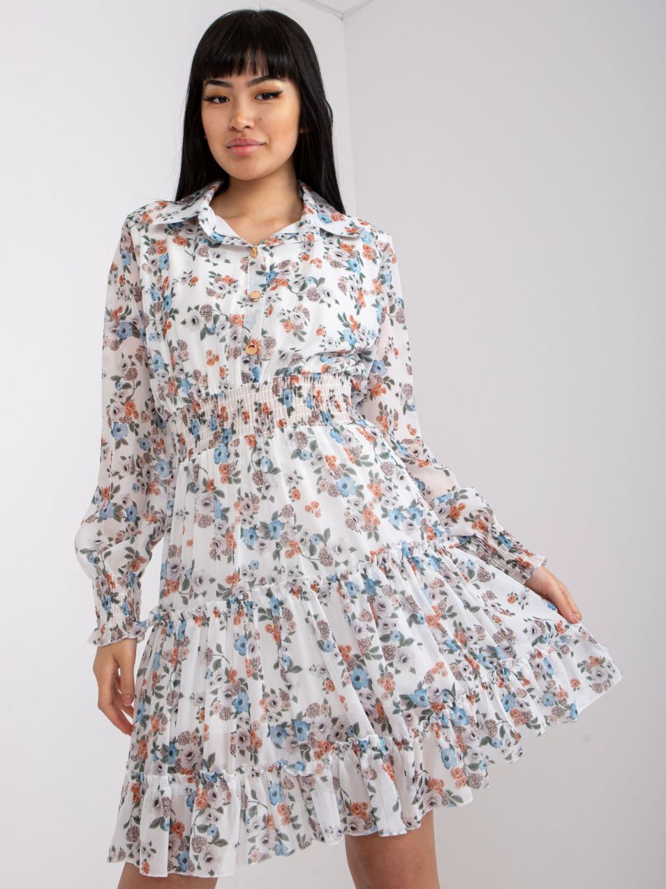 White dress with floral print and long sleeves
