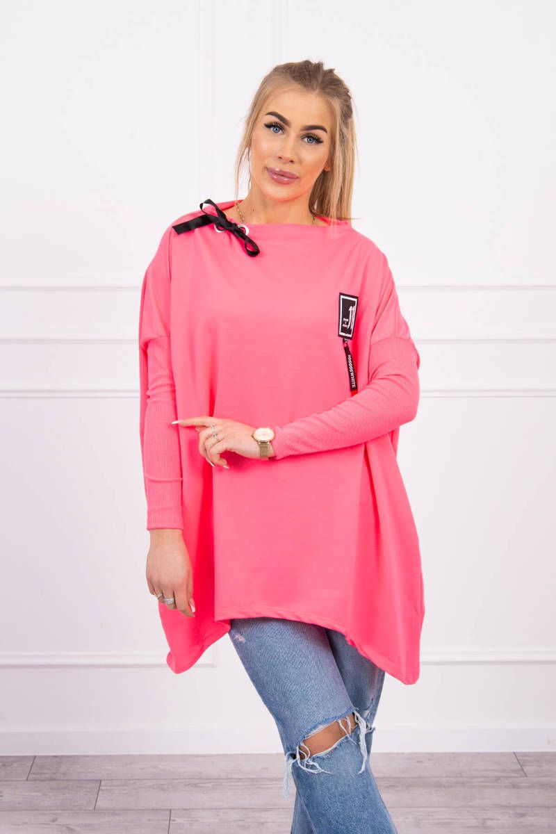 Oversize sweatshirt with asymmetrical sides in pink neon color
