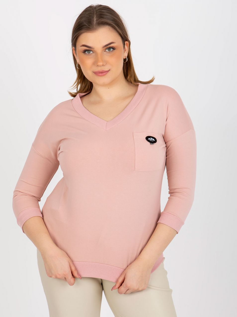 Light pink monochrome blouse of larger size with 3/4 sleeves