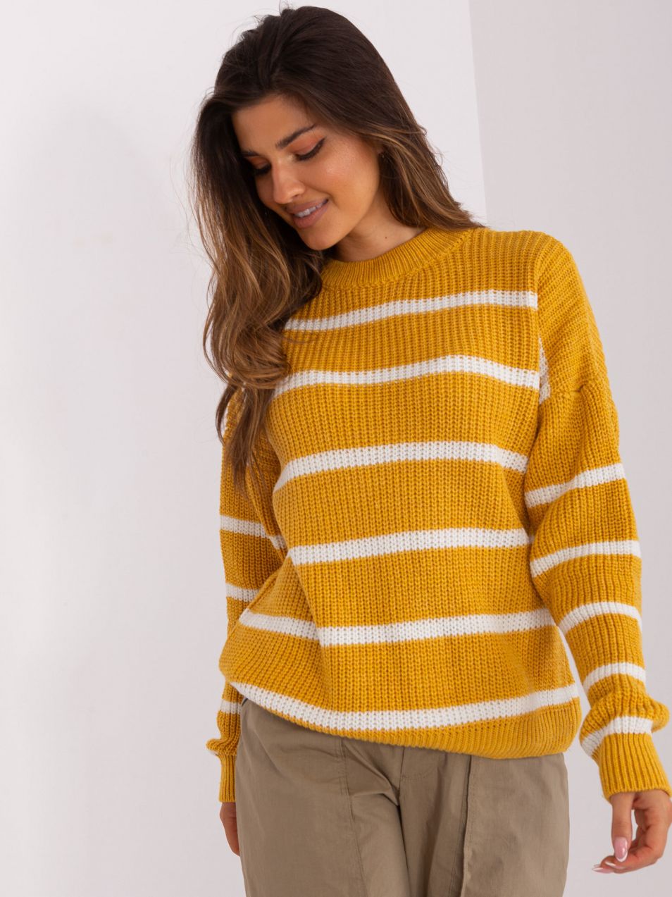 Dark yellow oversize sweater with a round neckline