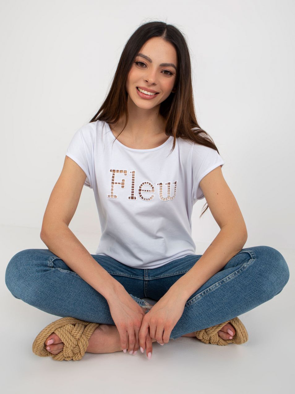 White women's monochrome T-shirt with cutouts