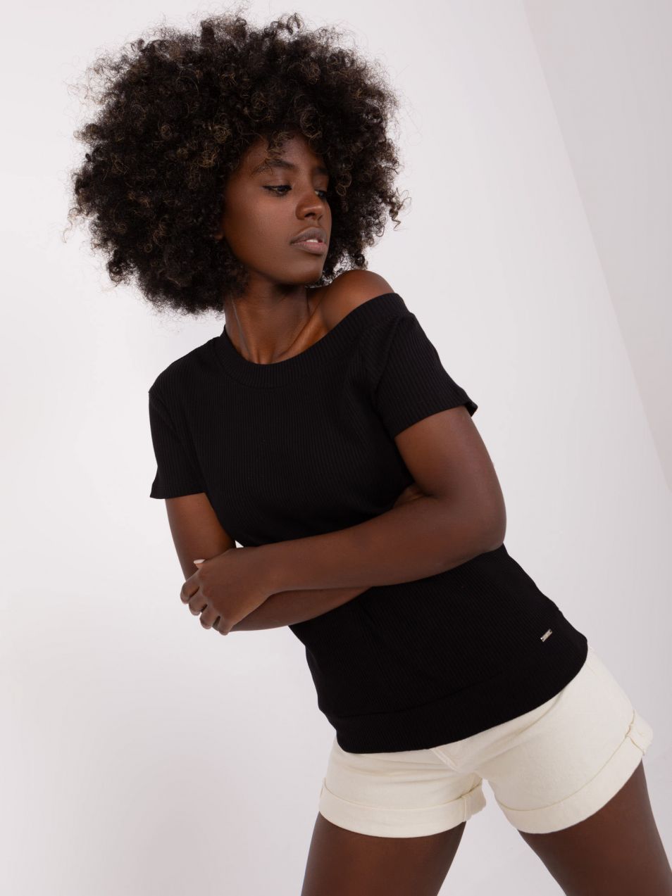 Basic black blouse with asymmetrical neckline