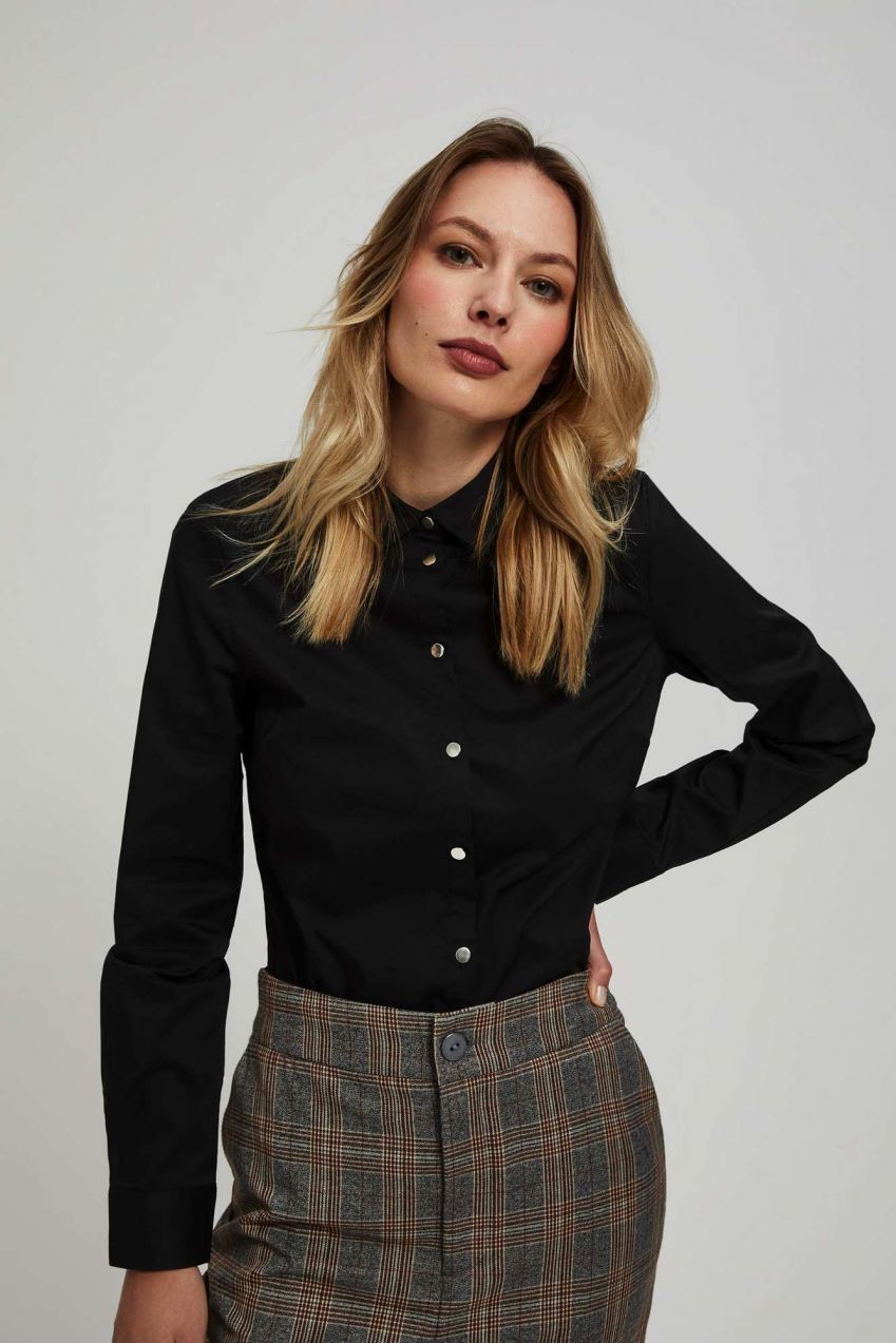 Plain shirt with decorative buttons