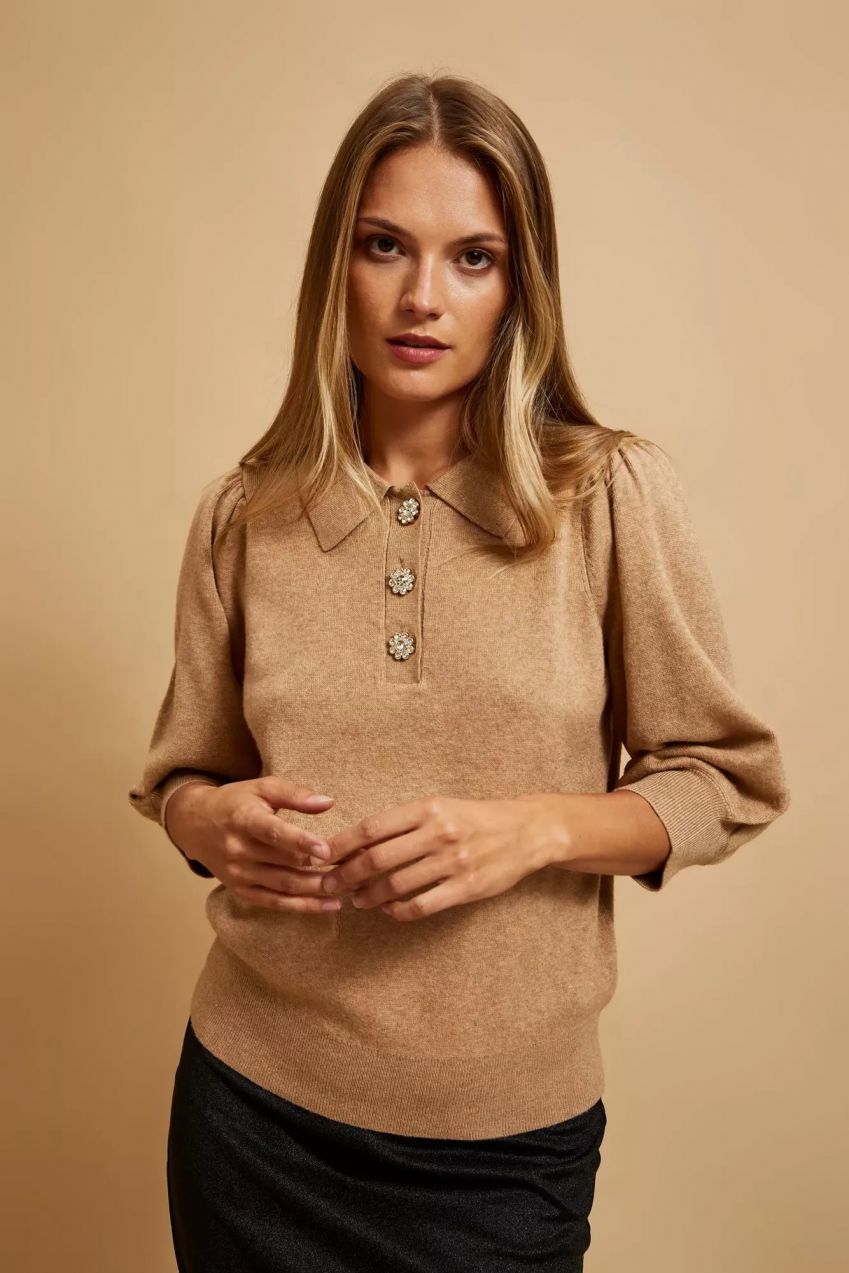 Sweater with decorative buttons