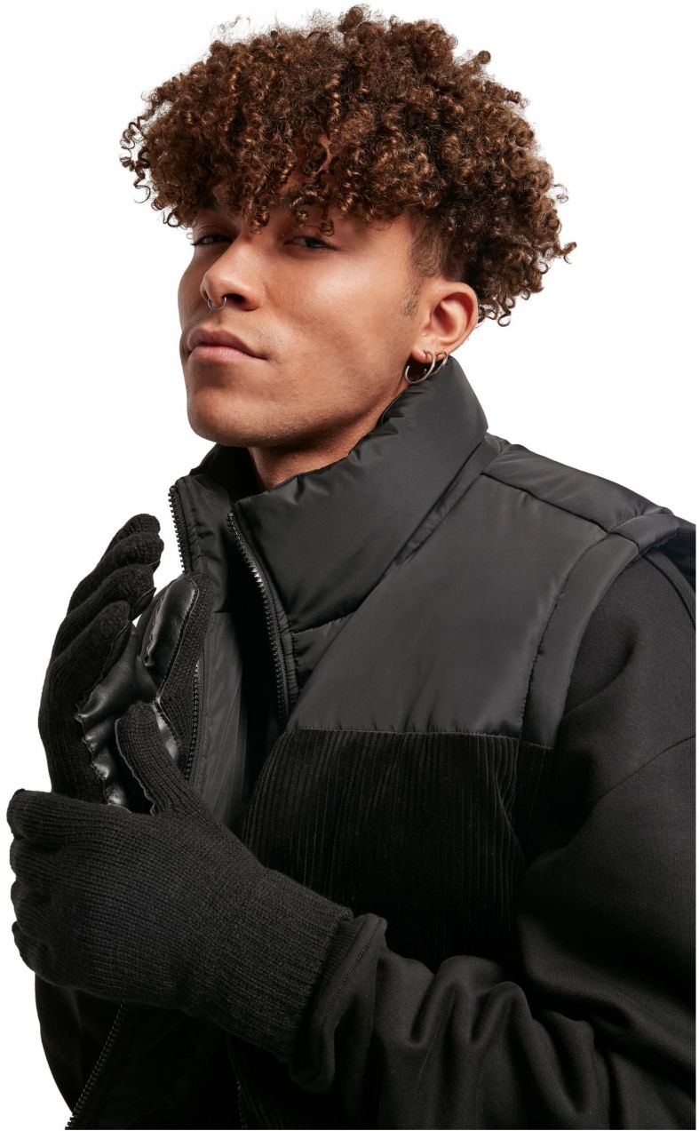 Knitted gloves made of black synthetic leather