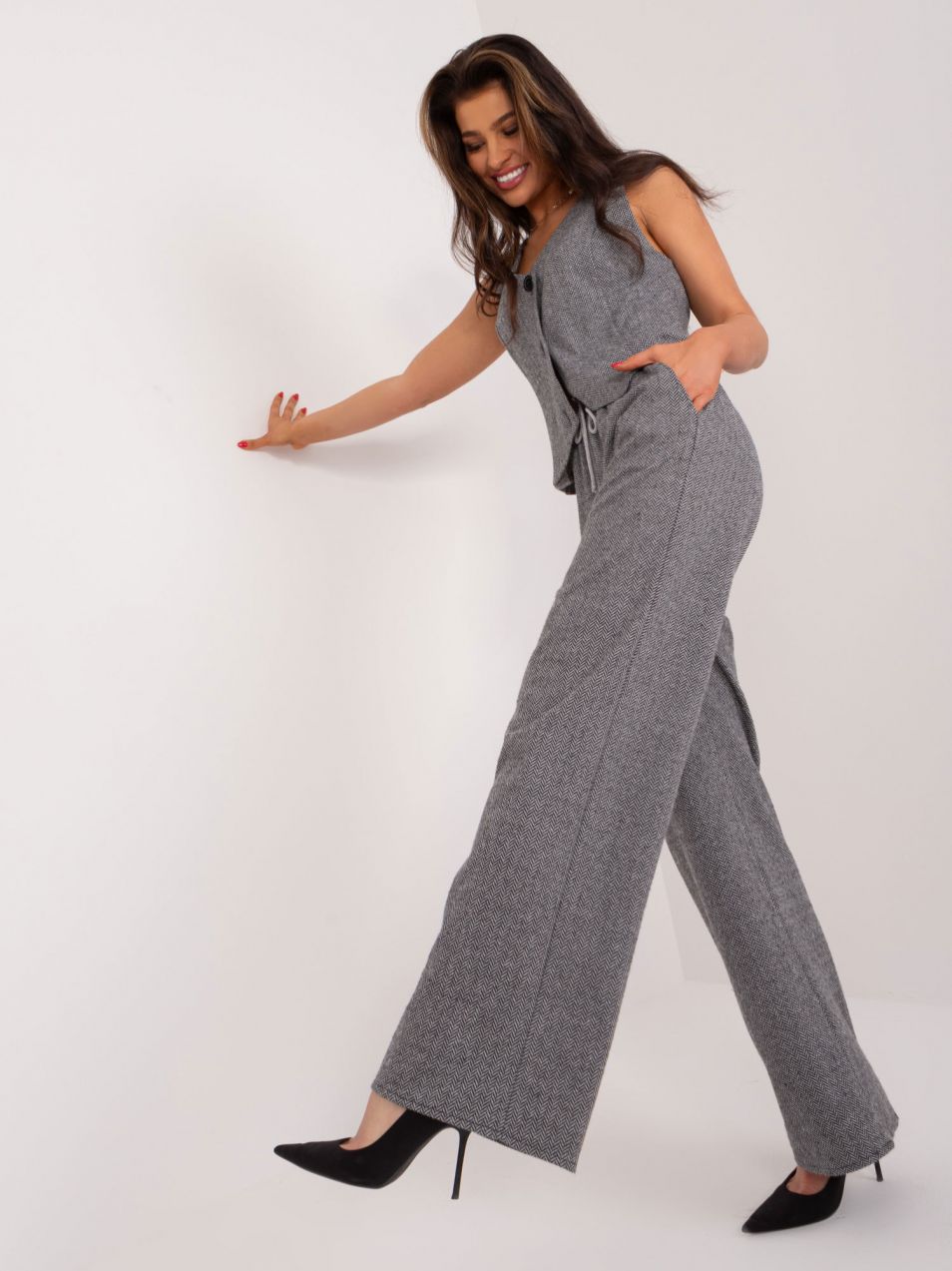 Black and grey fabric trousers with pockets