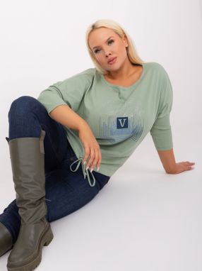 A pistachio blouse in a larger size with rhinestone appliqué
