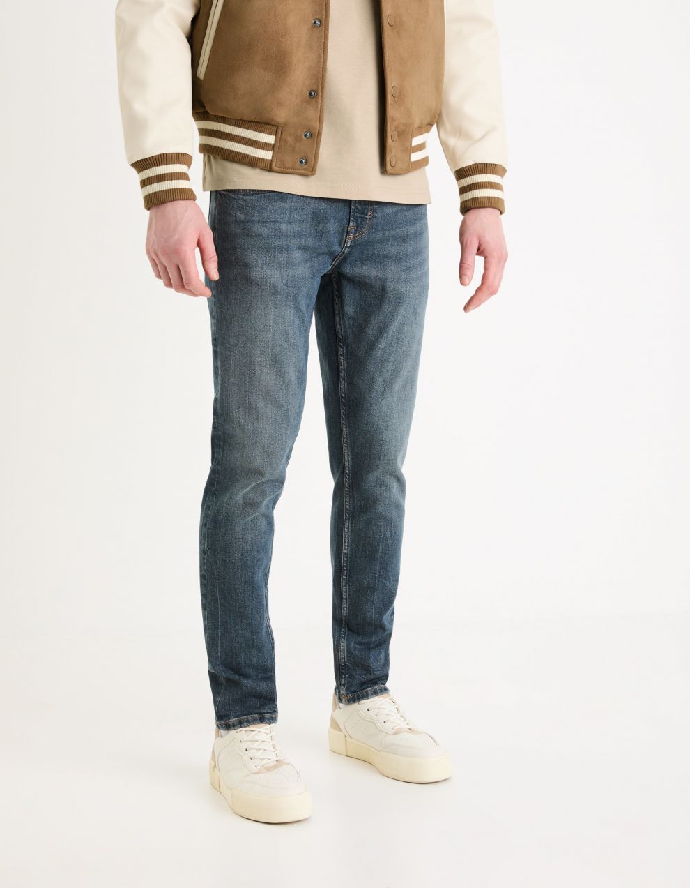 Tmavomodré pánske slim fit džínsy Celio Gotapered