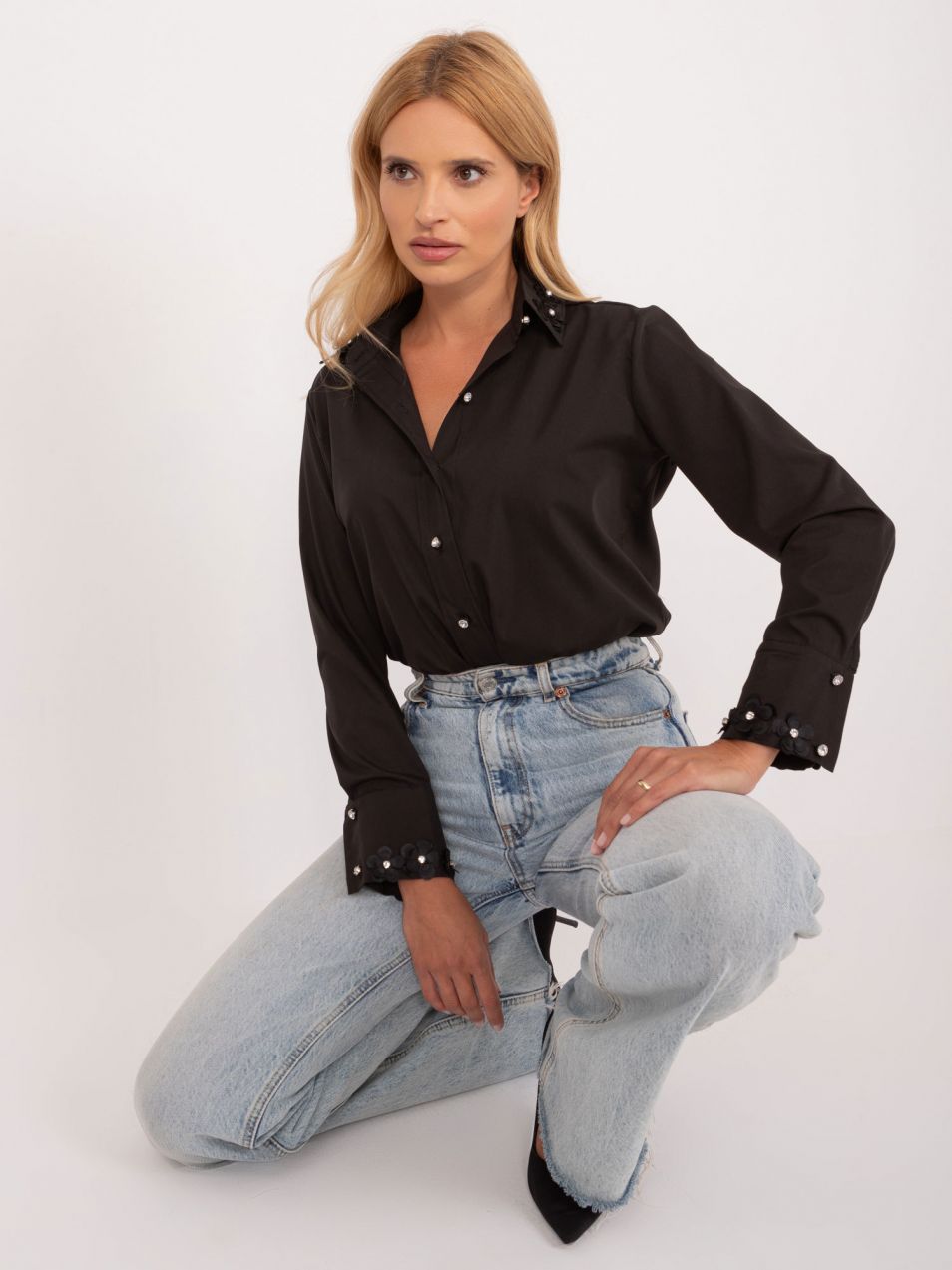 Black women's shirt with decorative buttons