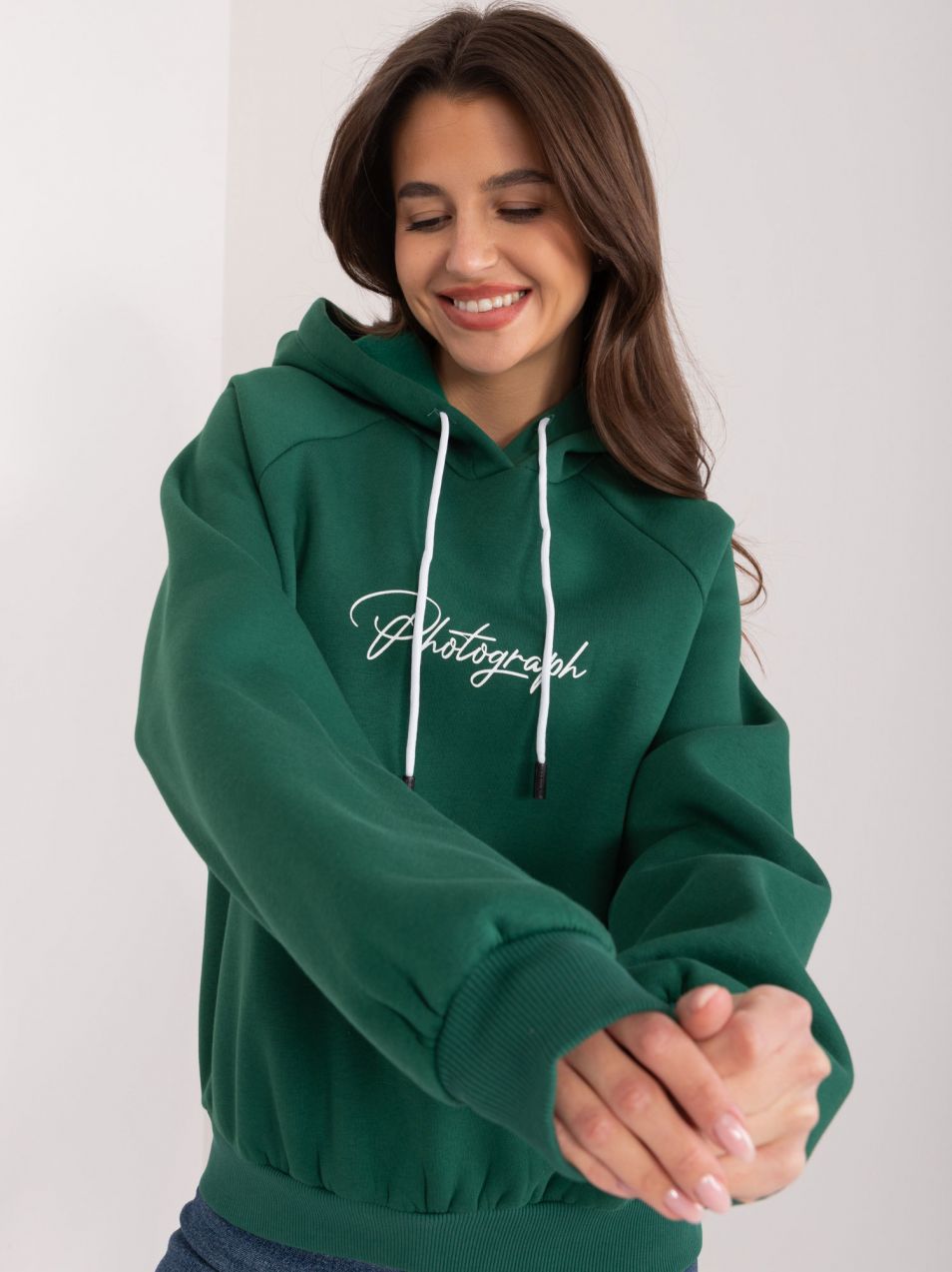 Dark green hoodie with lettering