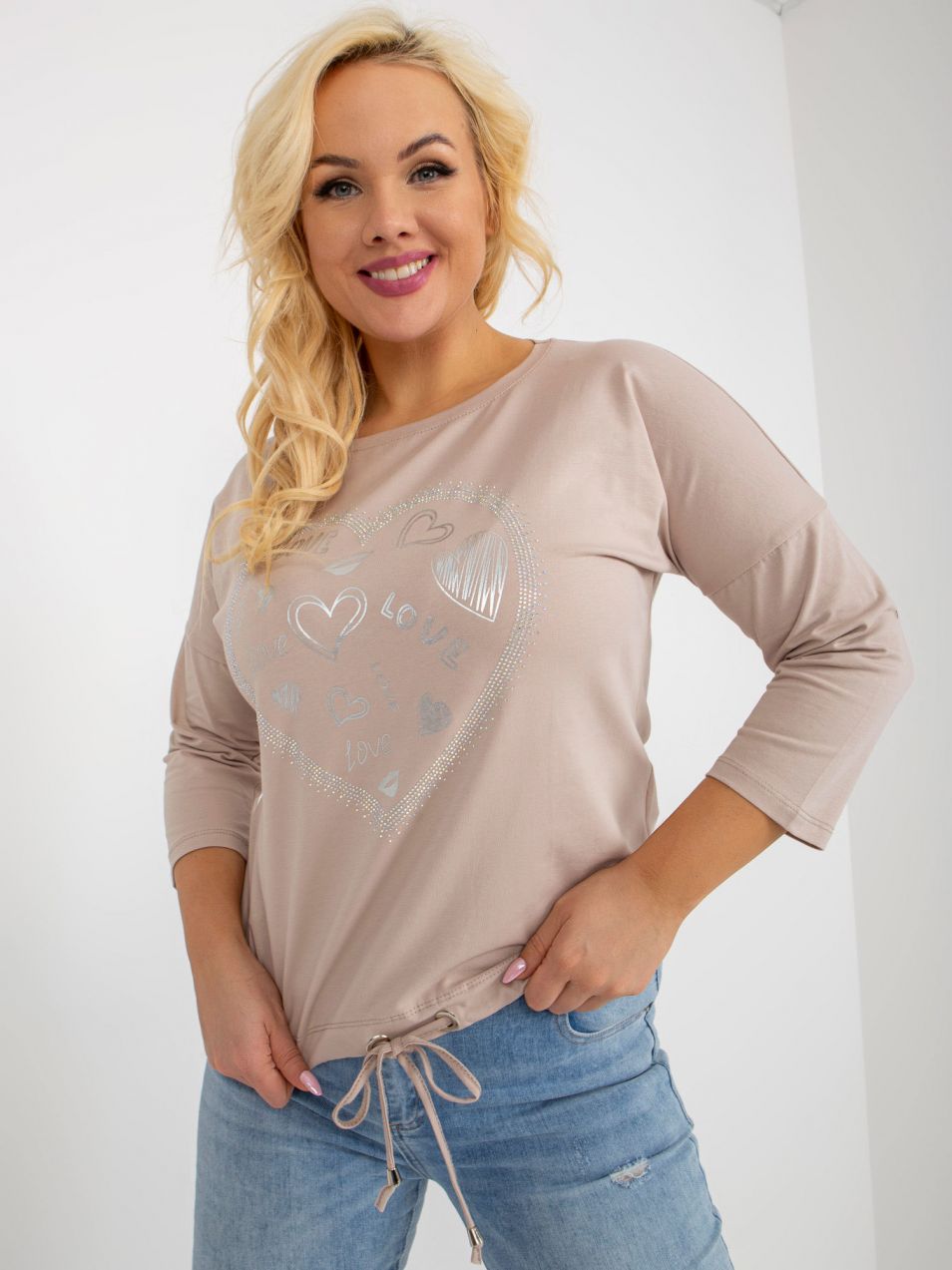 Beige blouse plus size with heart-shaped application