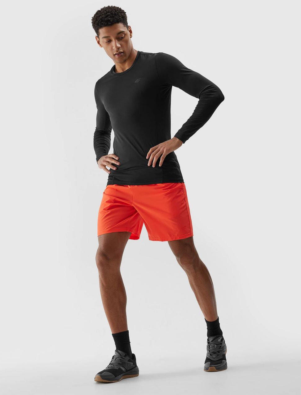 Men's Sports Shorts Made of 4F Recycled Materials - Orange
