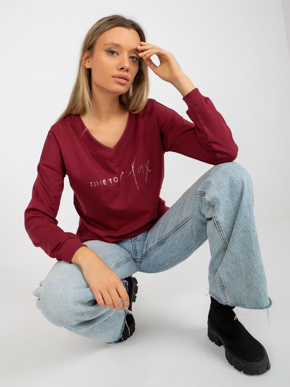 Lady's chestnut blouse with print and neckline