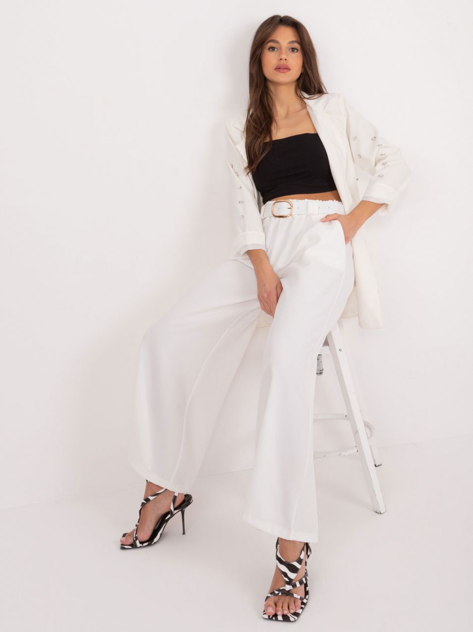 Cream trousers with wide legs