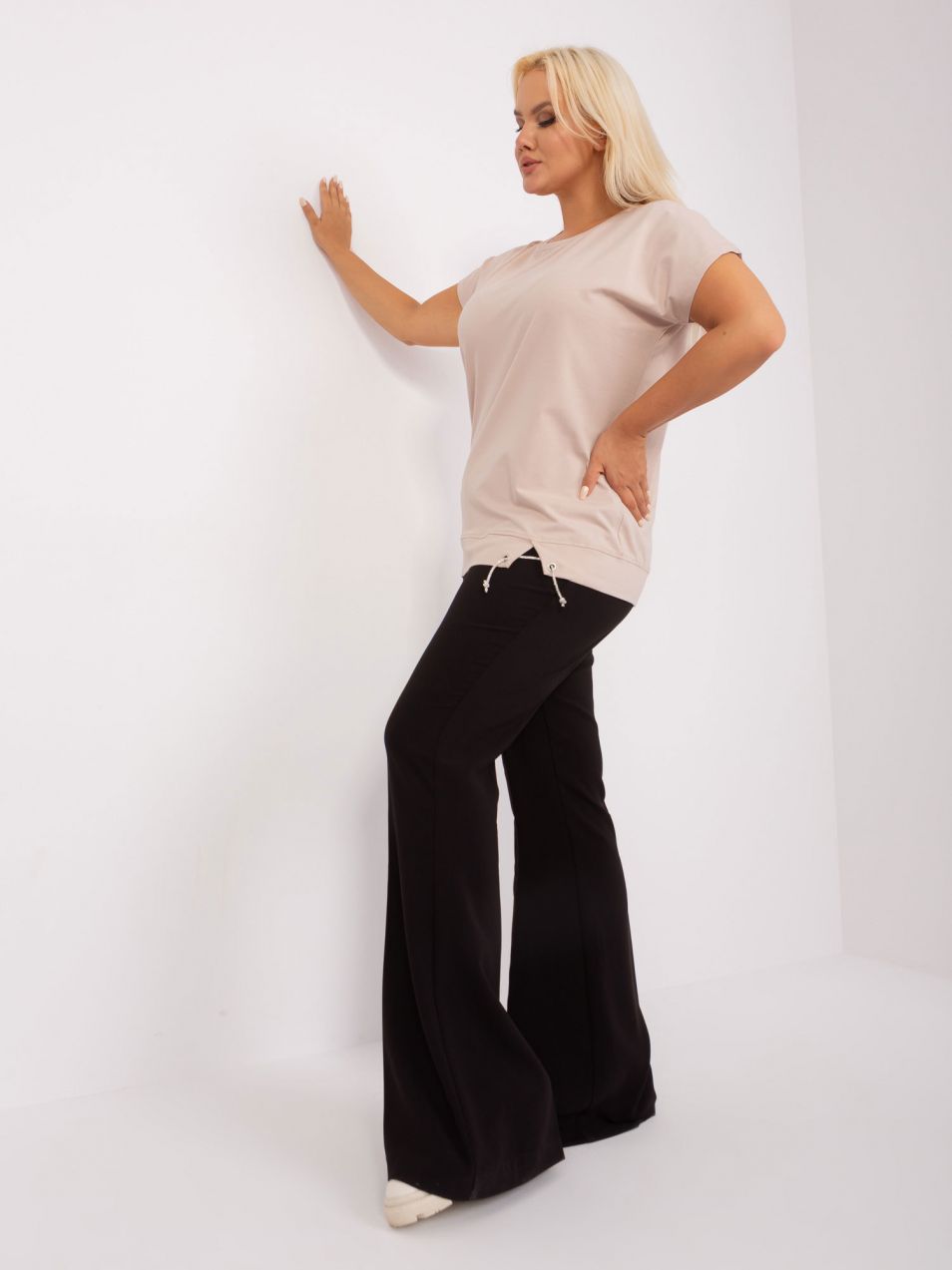 Beige blouse of larger size with short sleeves