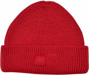 Knitted woolen hat with a large volume