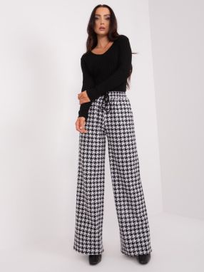Black and white patterned fabric trousers