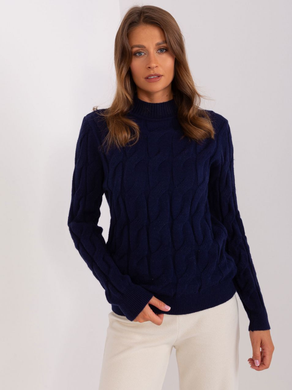 Navy blue sweater with cables and turtleneck