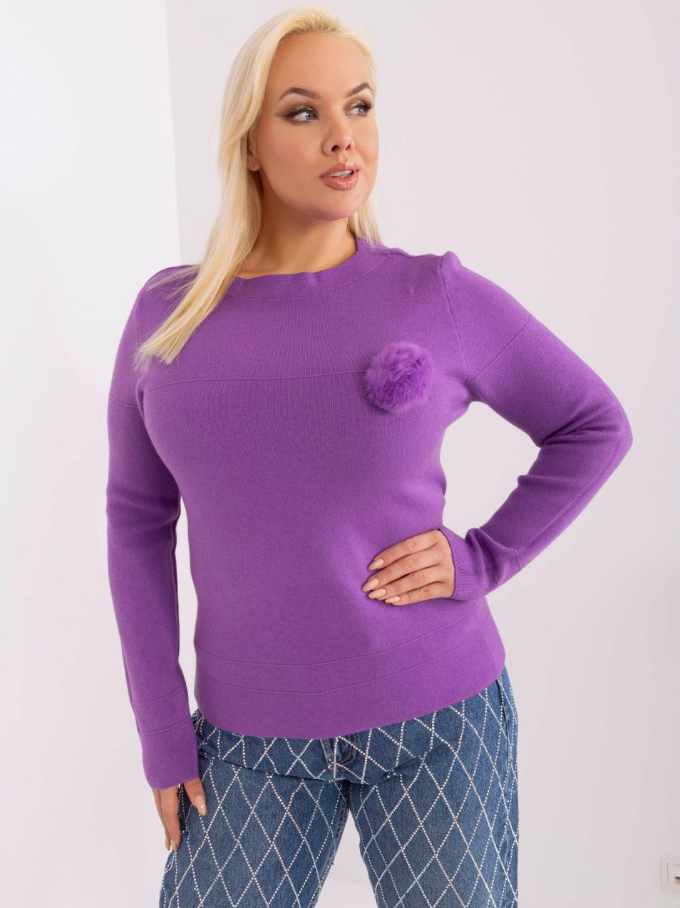 Purple knitted sweater made of viscose in a larger size