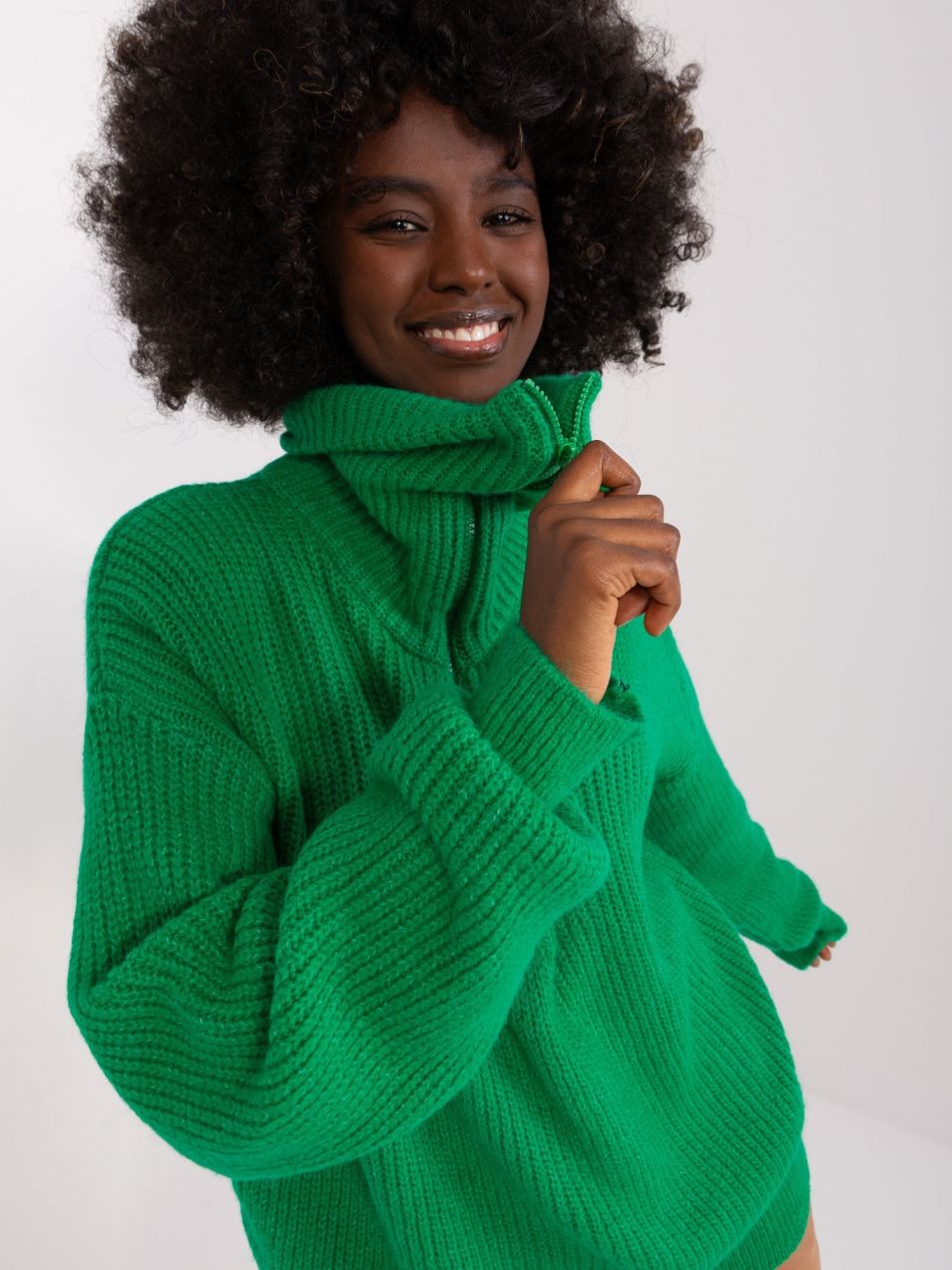 Green turtleneck with a zipper at the neckline